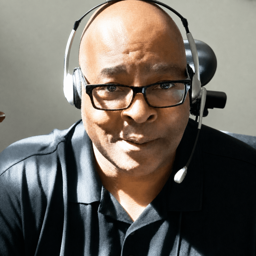 Ron Harris on a headset, recording an interview